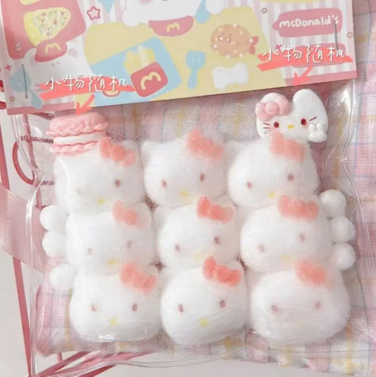 squishy Hello Kitty toy (nine in all)